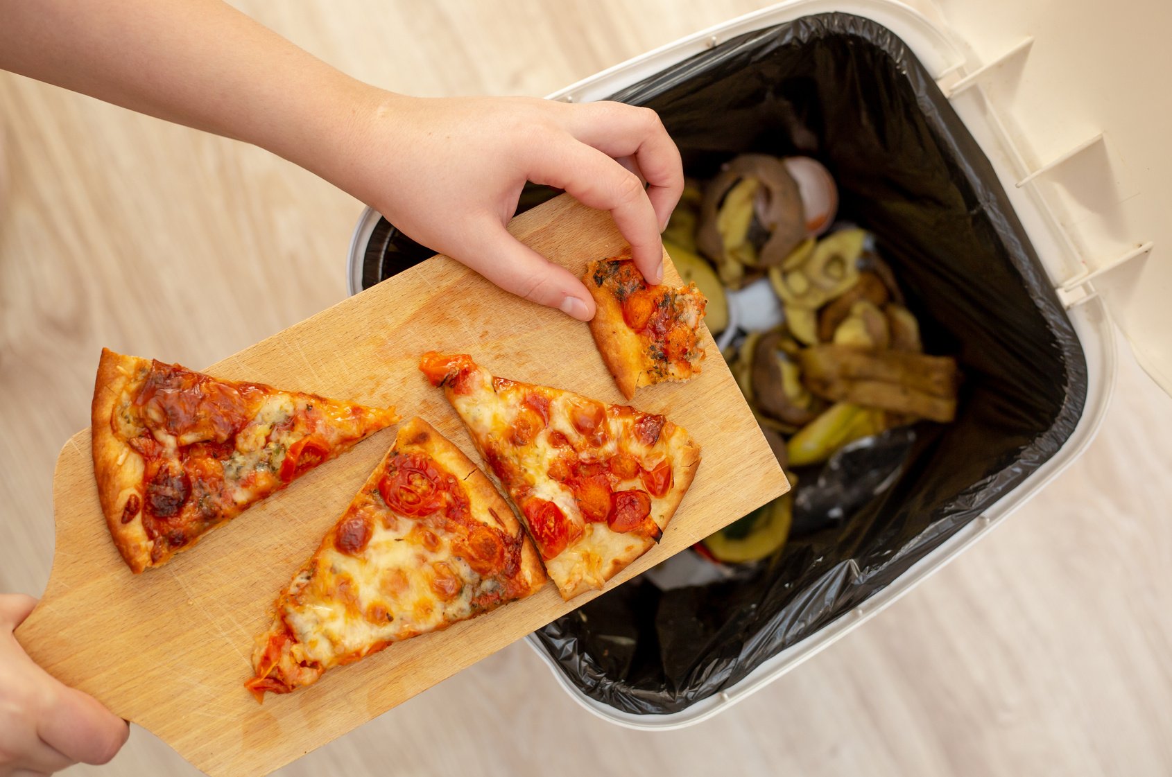 Woman Hands Throwing Food into the Trash, Bin, Waste of Food, Fo